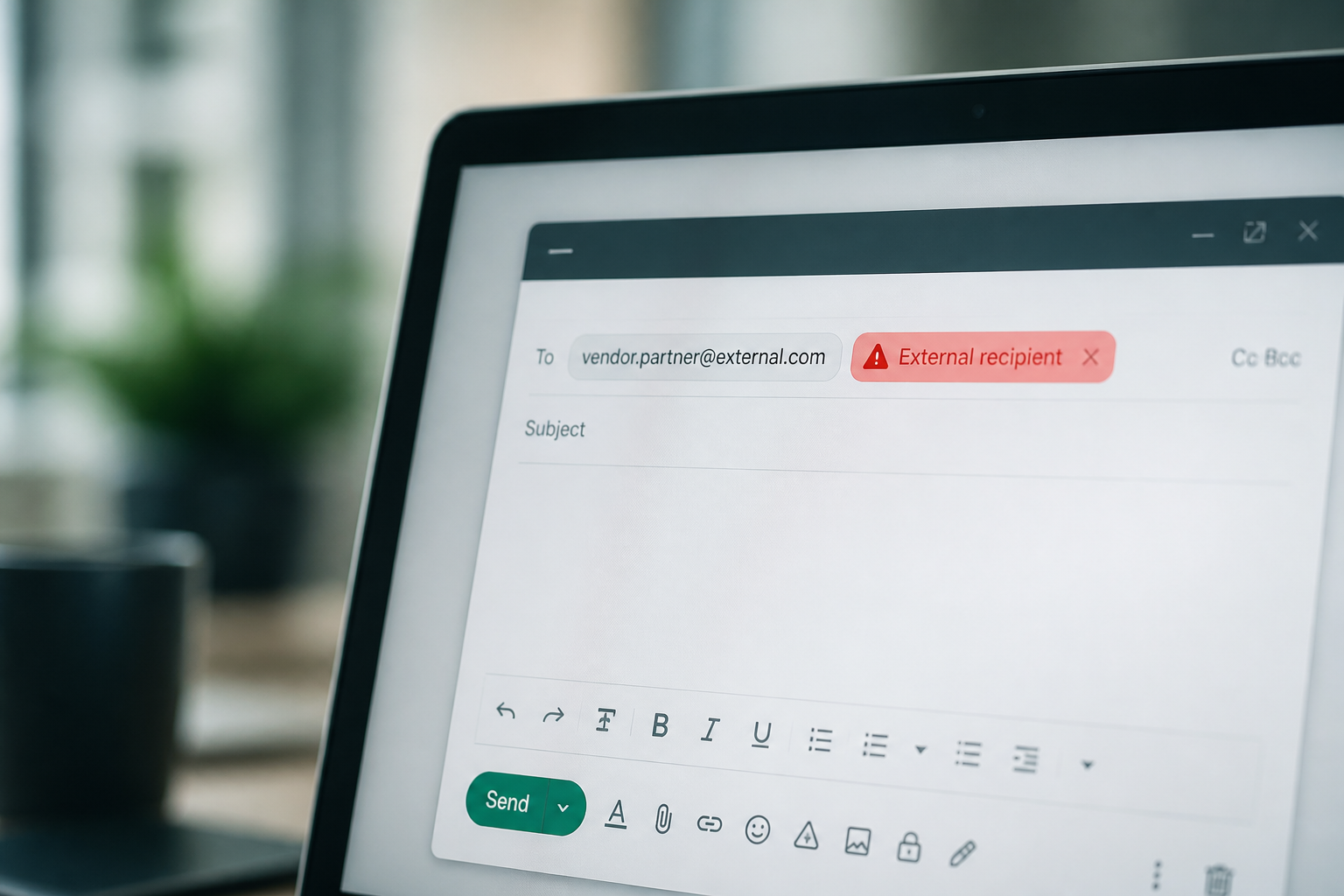 A Gmail compose window on a computer screen displaying a clear warning banner next to an external recipient's email address, highlighting enhanced gmail security audit for small business.